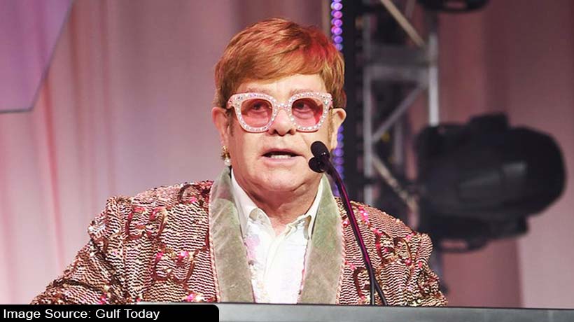 elton john gucci tracksuit